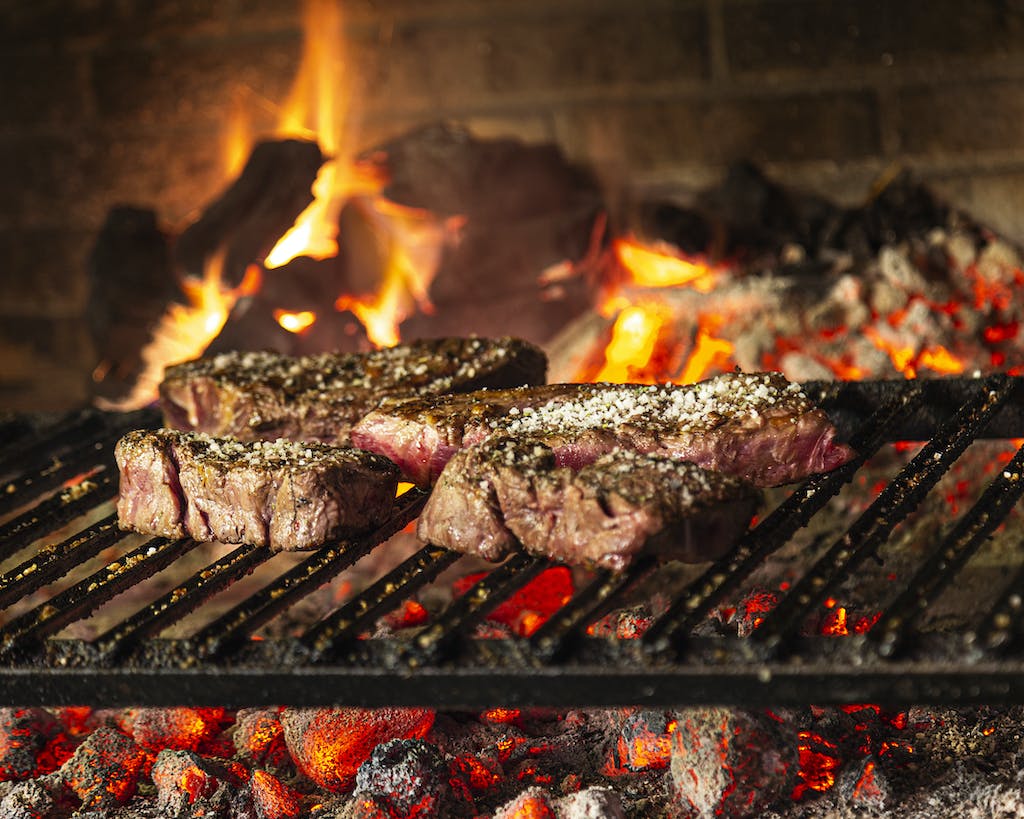 Grilled Meat On Charcoal Grill